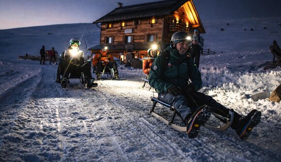 Slittata notturna e cena in baita