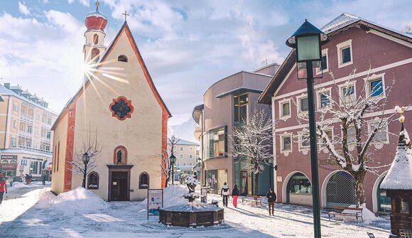 Olympischen Fackel in St. Ulrich